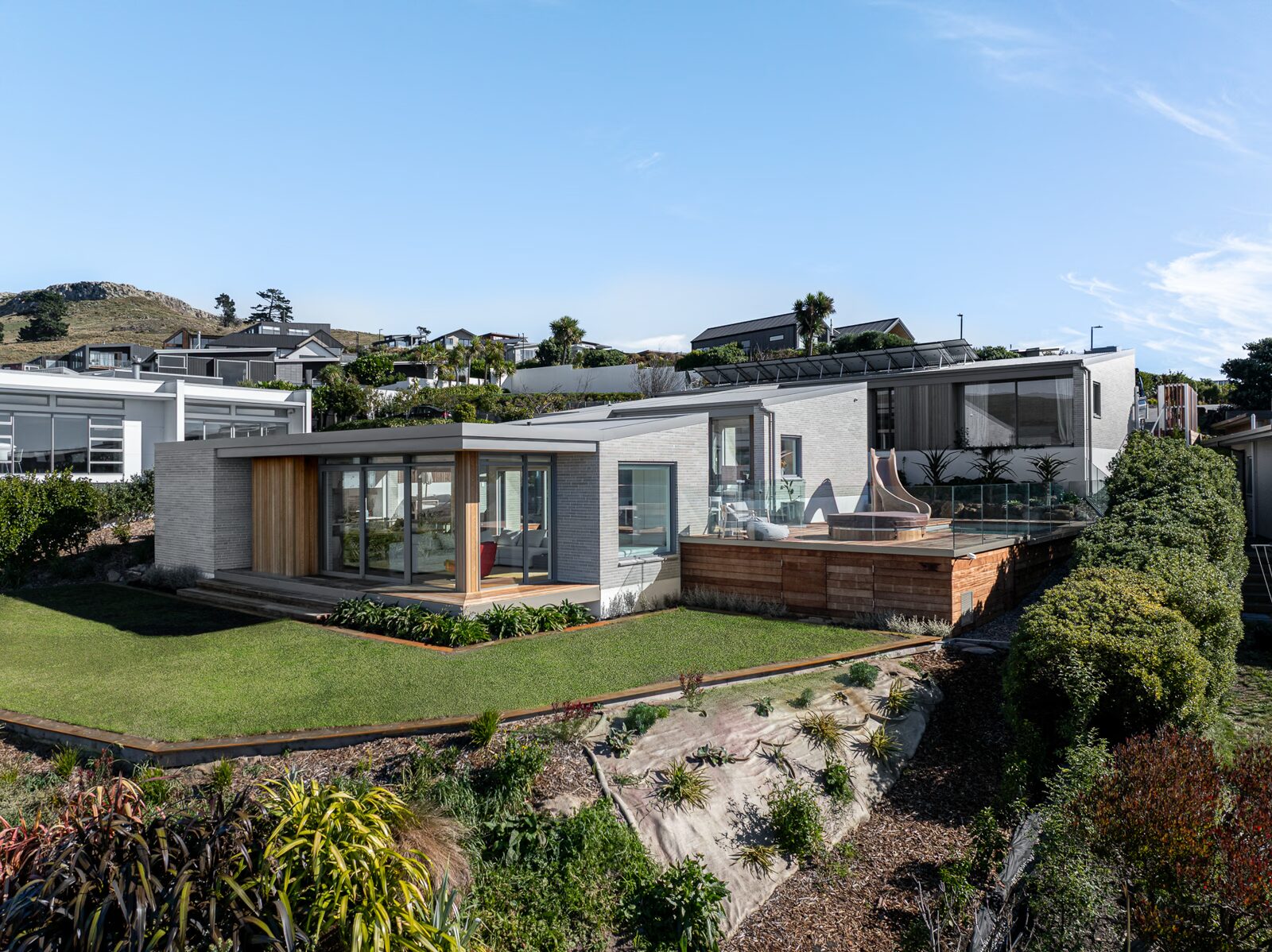 Sumner House exterior featuring Grey Viblock 450 Slim concrete bricks with white mortar